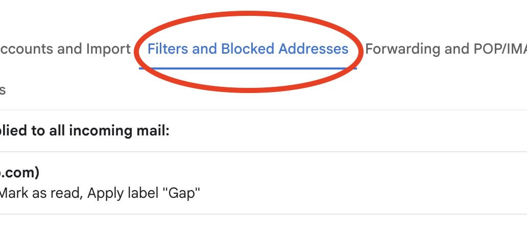 The Filters and Blocked Addresses option circled in the Gmail interface