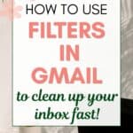 the words"how to use filters in gmail to clean up your inbox fast!" superimposed on a photo of a black laptop on a table