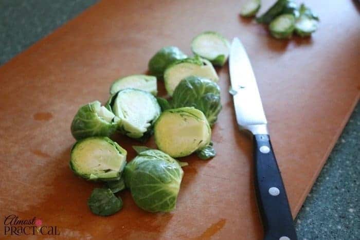 Trim and halve the brussels sprouts.