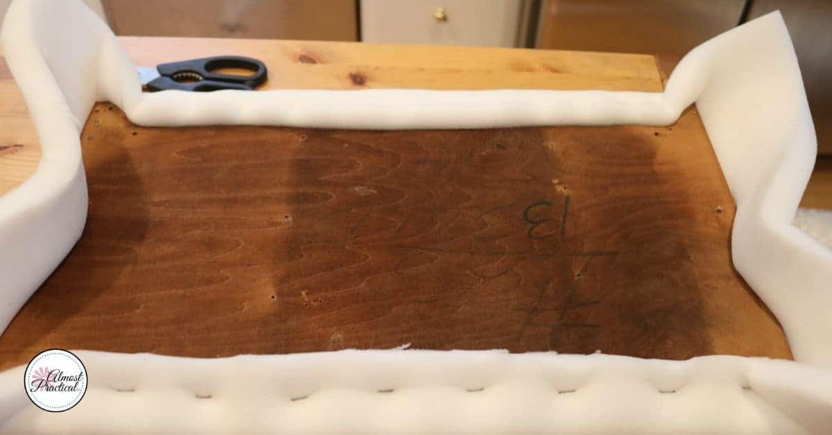 This is how I stapled the foam onto the bench seat. After watching these tutorial videos for how to reupholster a bench, I think I would have done it differently.