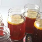 homemade iced tea in mason jars with lemon
