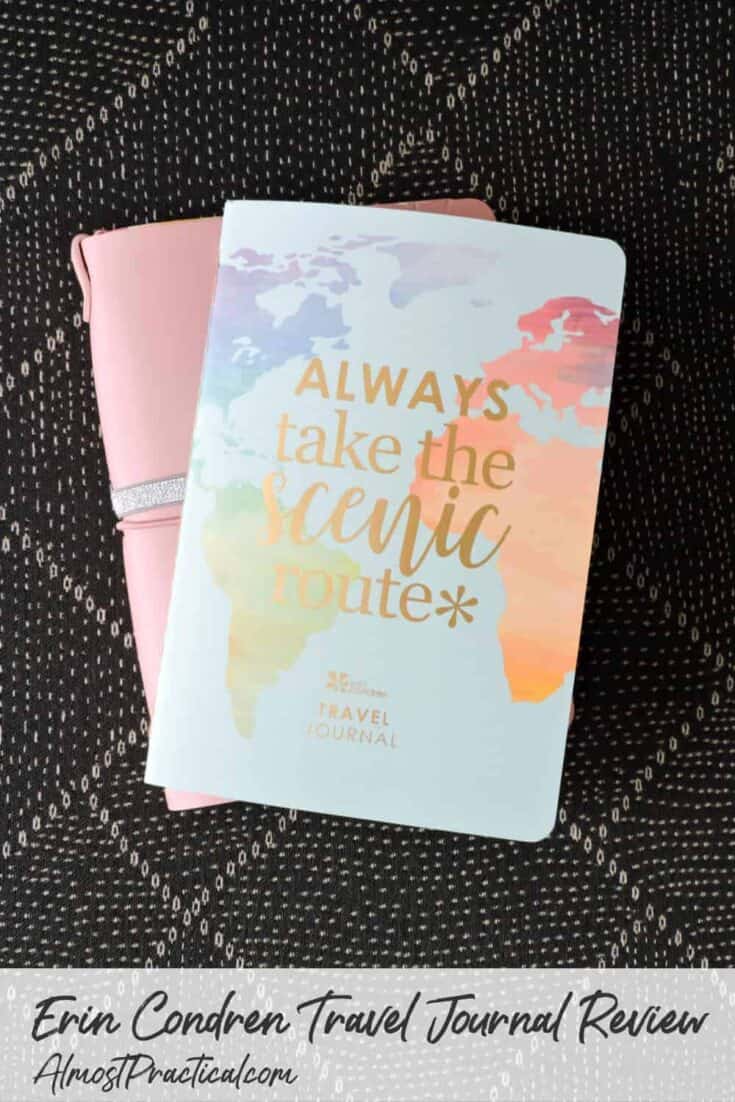 A photo of the front cover of the Erin Condren Travel Journal resting on top fo the Mauve Petite Planner Folio System - on black patterned table/background.