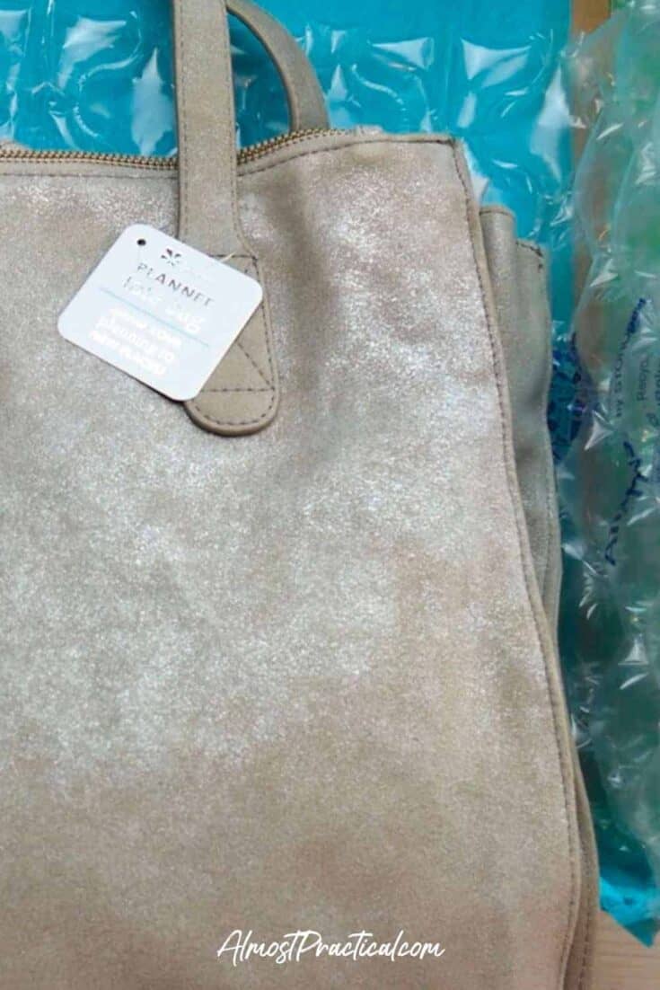 photo of the Erin Condren Metallic Suede Planner Tote in the box