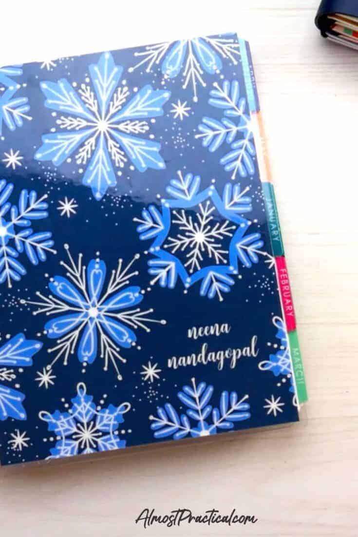 my 2020 erin condren lifeplanner with a snowflake pattern cover.