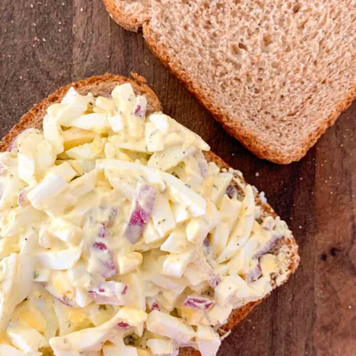 open face egg salad sandwich on wheat