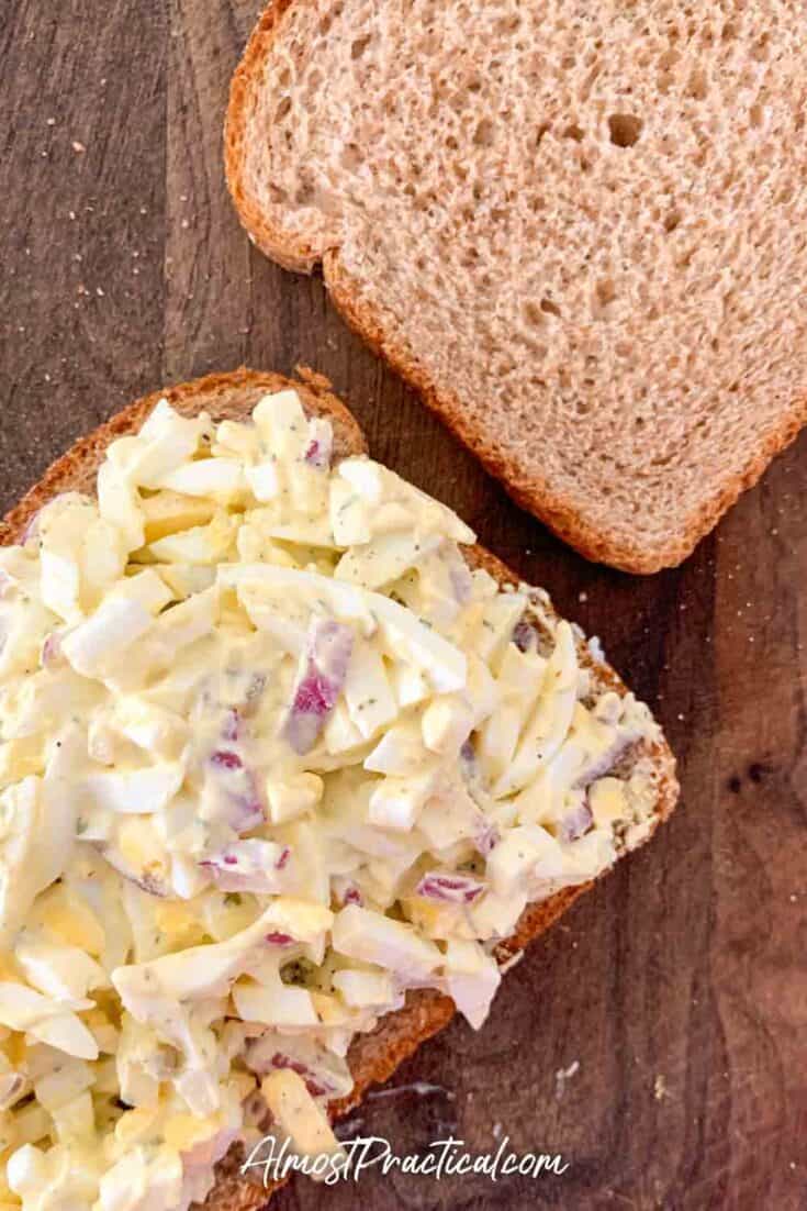 open face egg salad sandwich on wheat