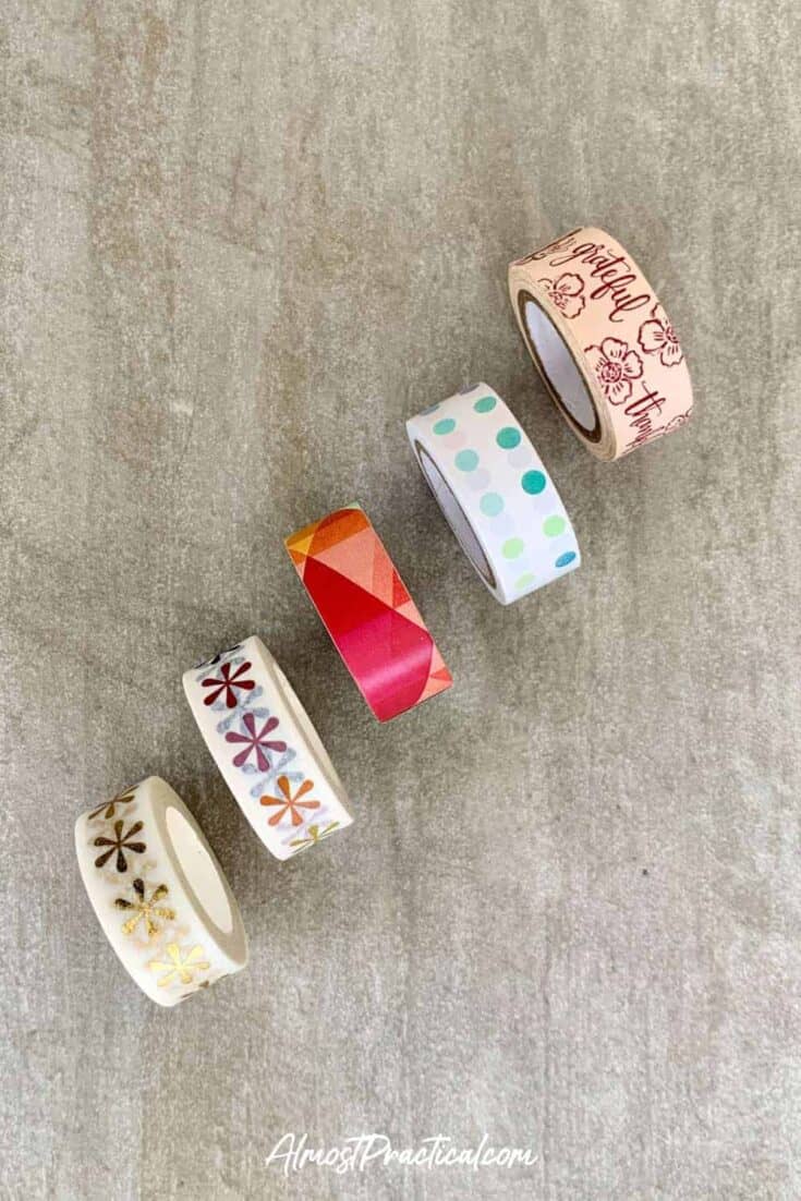 Five rolls of Erin Condren washi tape.