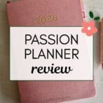 the words "Passion Planner Review" superimposed on a photo of a pink Passion Planner on a gray tabletop