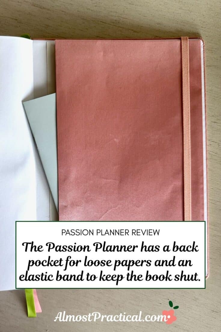 the words "The Passion Planner has a back pocket for loose papers and an elastic band to keep the book shut." superimposed on a photo of the pocket in the back cover of the Passion Planner