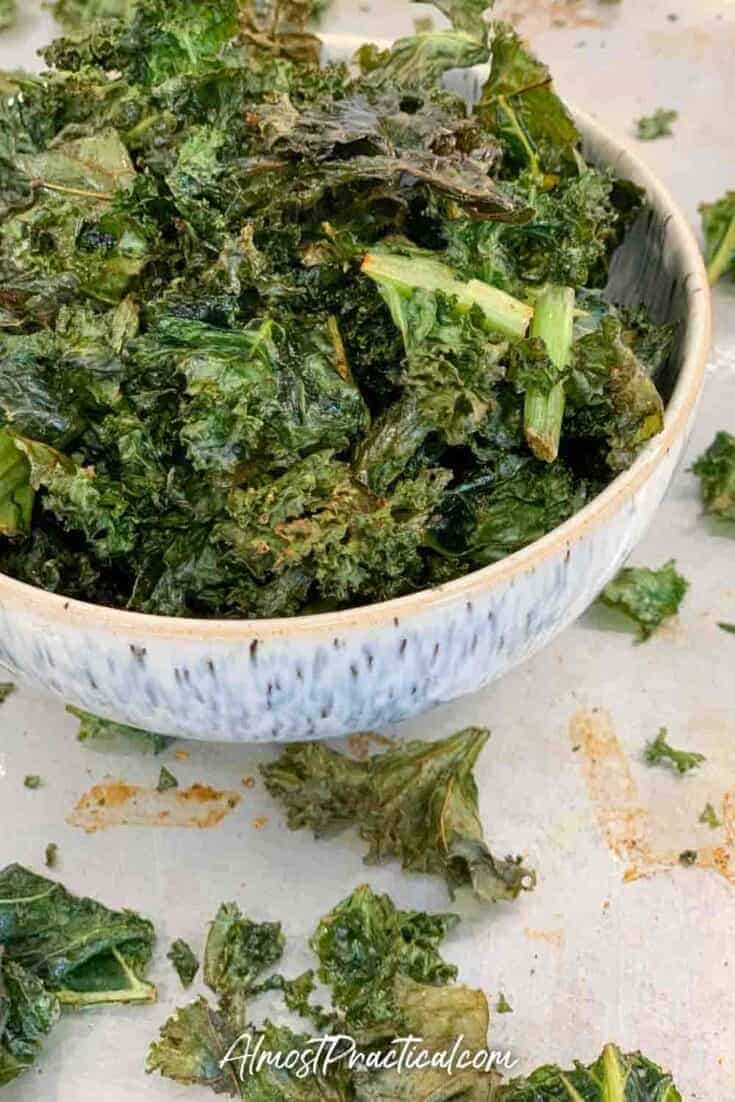 a bowl of homemade kale chips