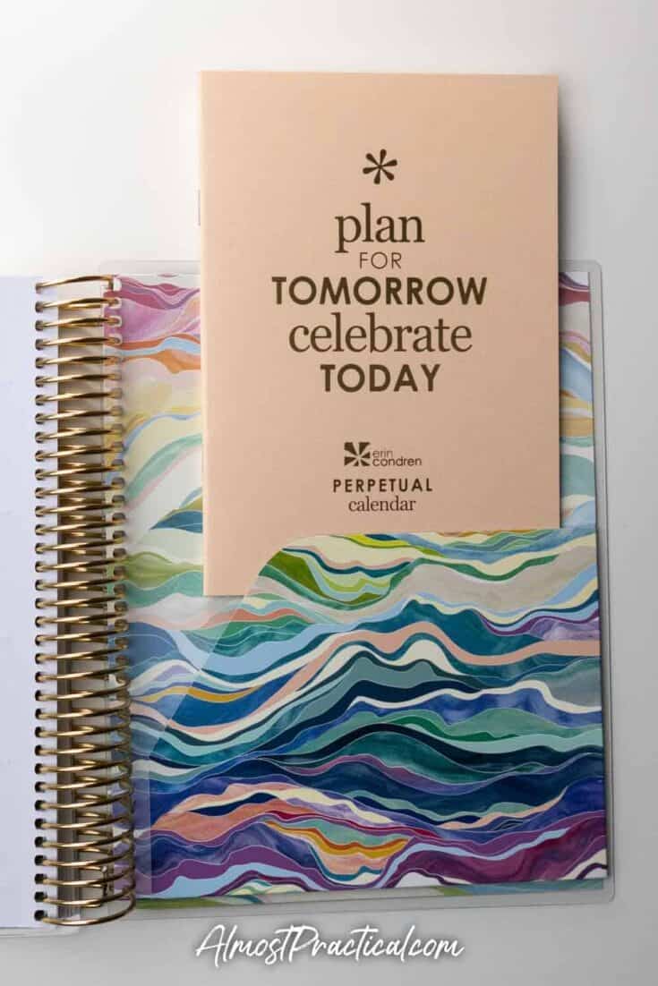 The Perpetual Calendar and folder in the back of the Erin Condren Coiled LifePlanner in the colorful Layers design.