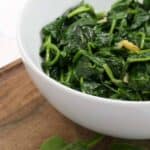 Wilted Spinach with Garlic in a serving bowl.