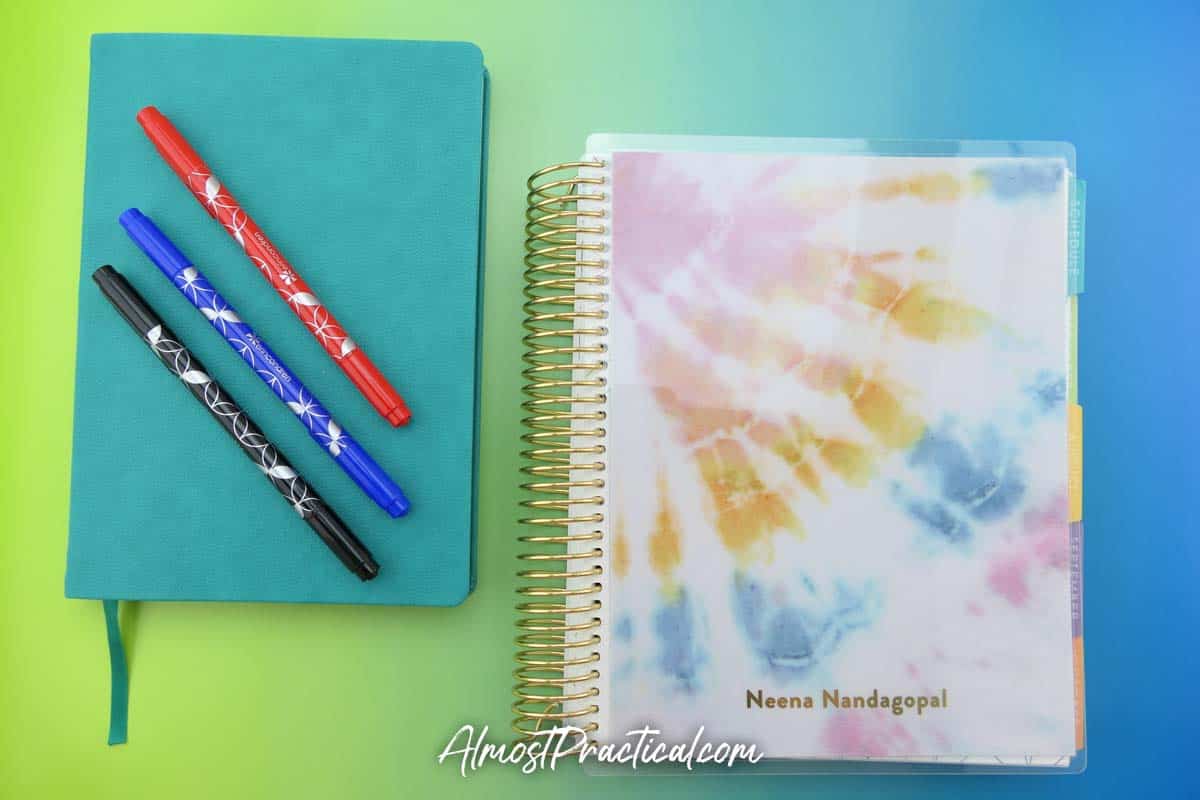 Erin Condren softbound and coiled academic planners side by side