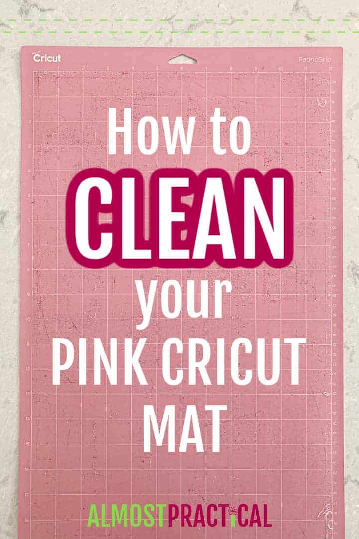 Pink cricut mat with string on it.