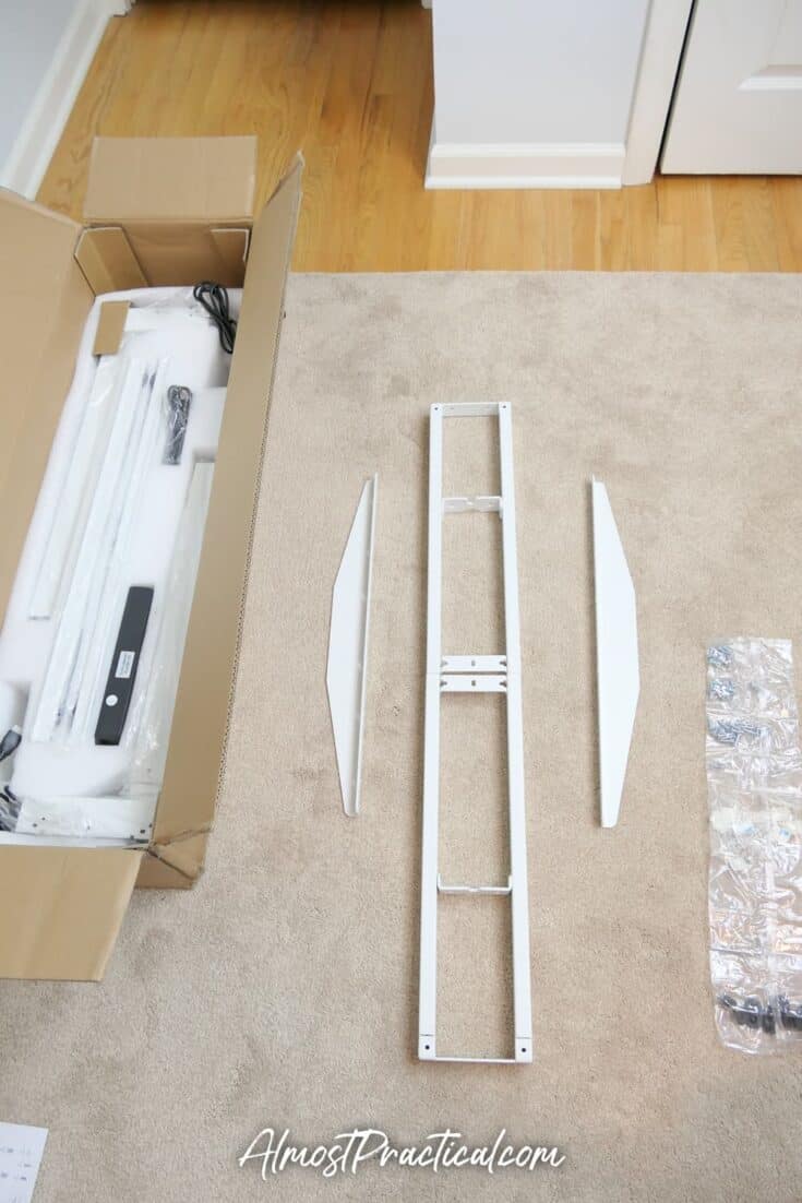 parts of the Autonomous standing desk in box before assembly