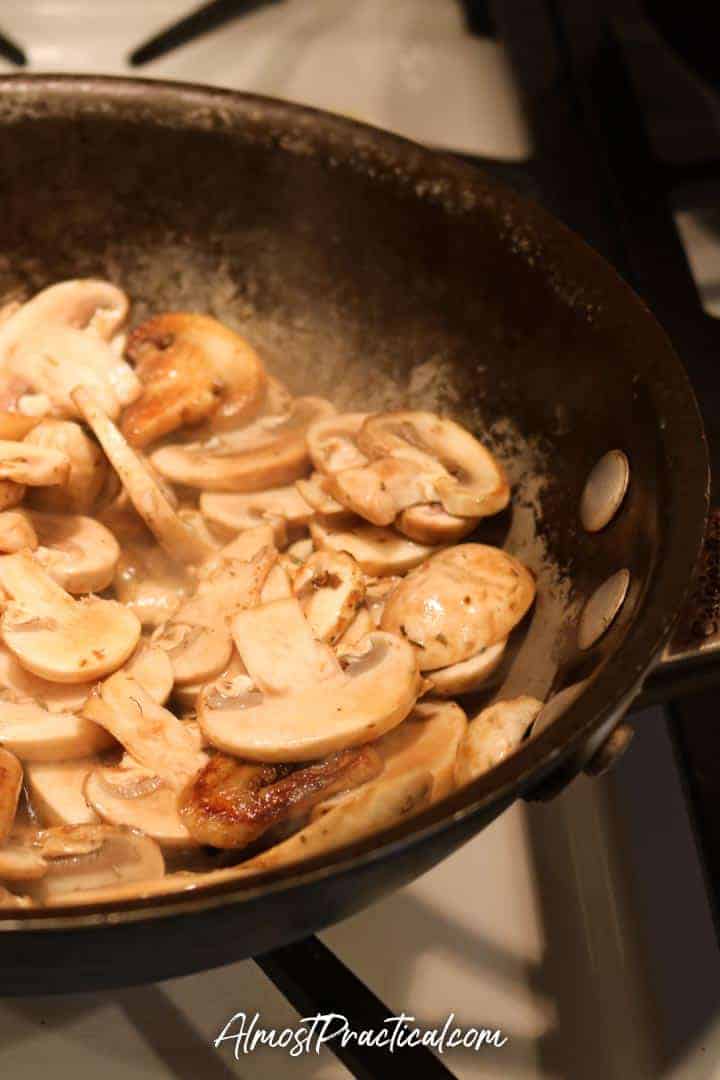 mushrooms cooking in pan