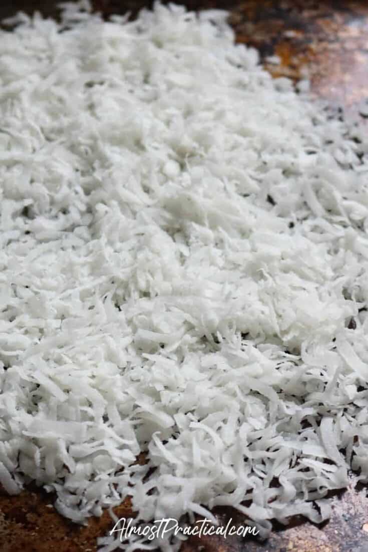 coconut flakes on a baking sheet