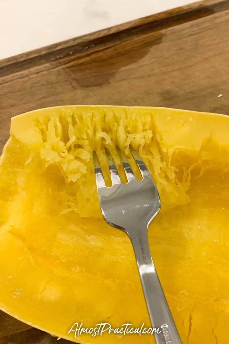 fork separating spaghetti squash from shell