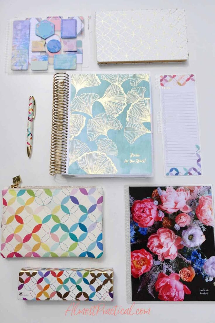 collection of Erin Condren planners and accessories