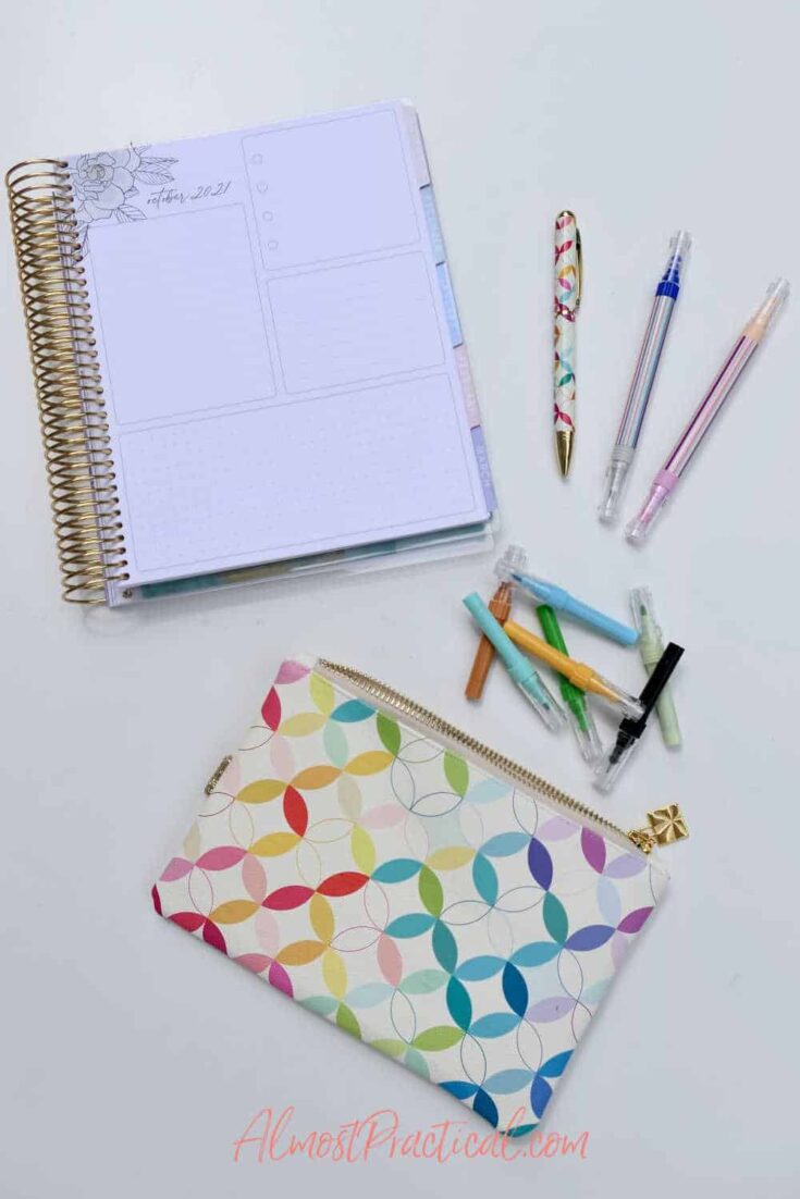 collection of Erin Condren planners and accessories