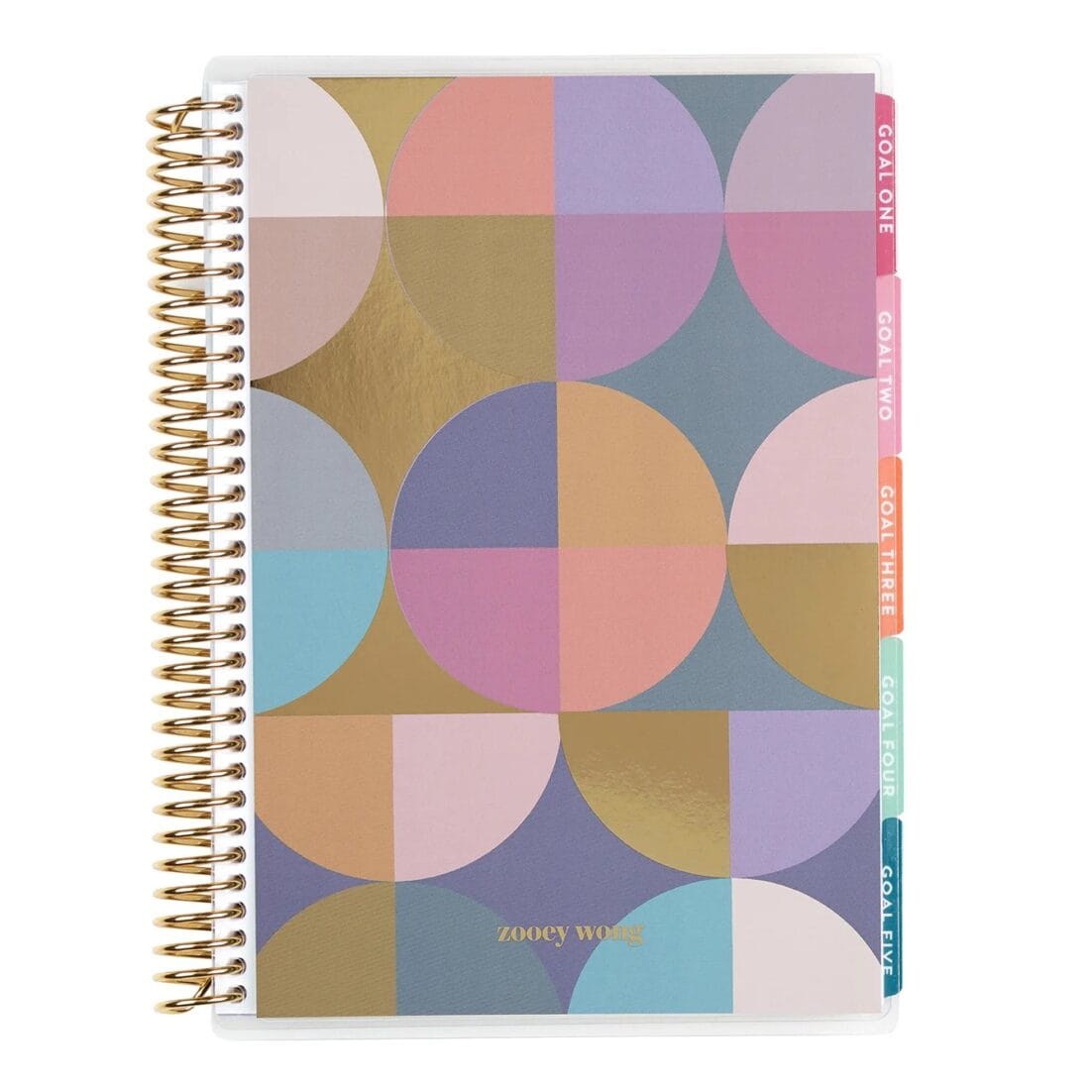 a spiral notebook with circle design on cover