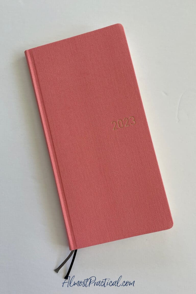 coral color wallet size planner book