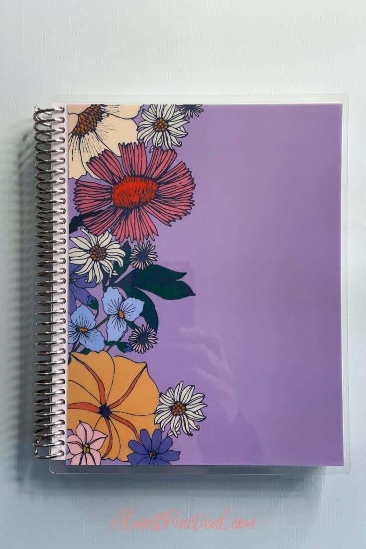 coiled notebook with a floral cover