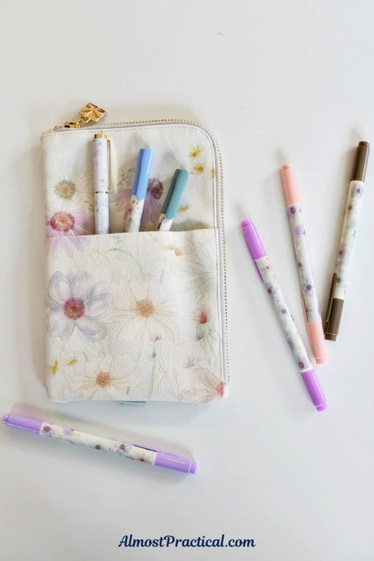 zippered floral pouch with pens