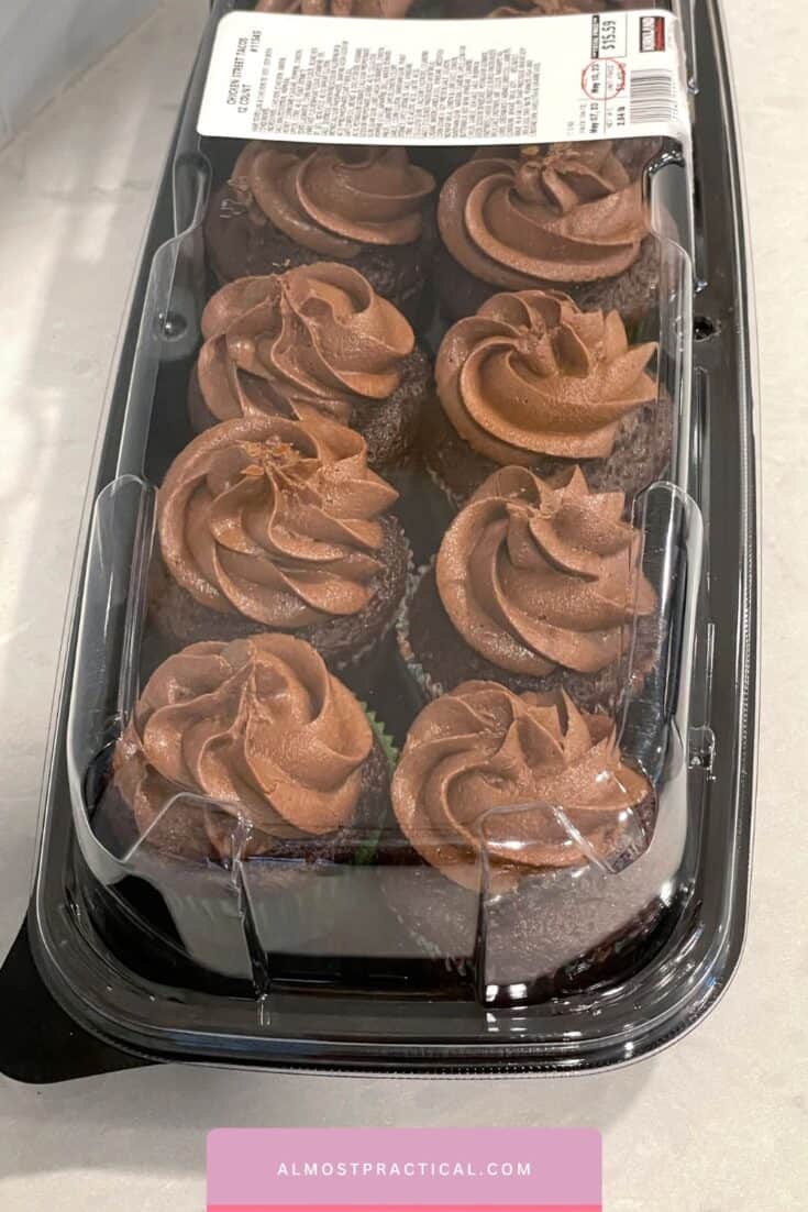 tray of chocolate cupcakes with chocolate frosting