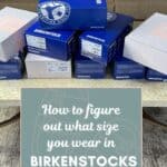 stack of birkenstock shoe boxes on coffee table