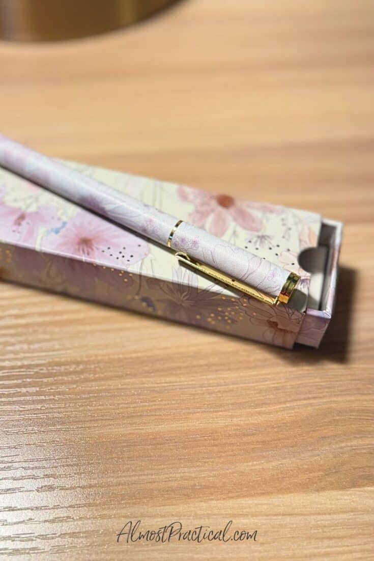 pretty pen with a floral print on barrel