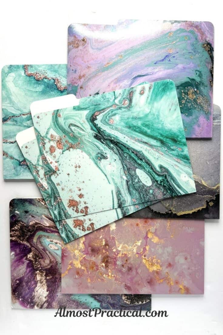 Collection of office file folders that feature colorful marble designs.