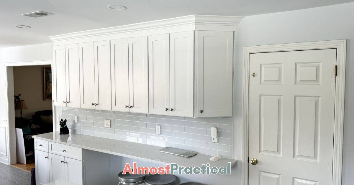white cabinets over counter on wall