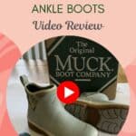 pair of muck boots ankle style with youtube play symbol on top