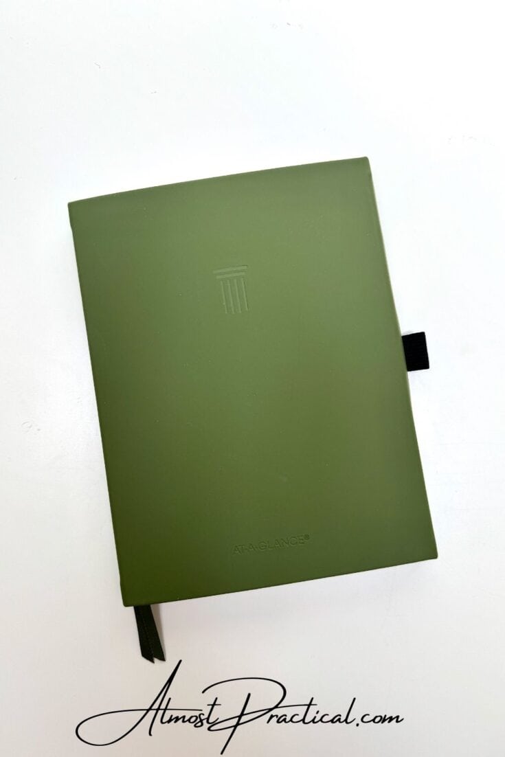 an olive green planner book