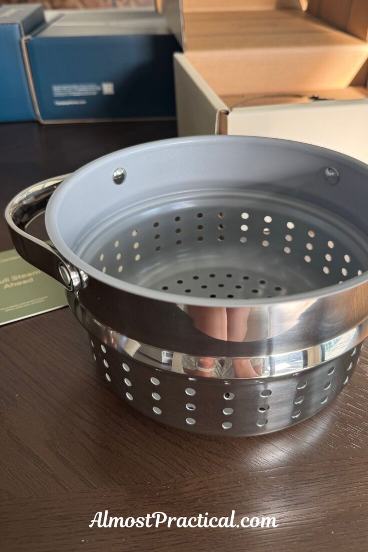 a photo of the small Caraway ceramic coated steamer basket in stainless steel finish