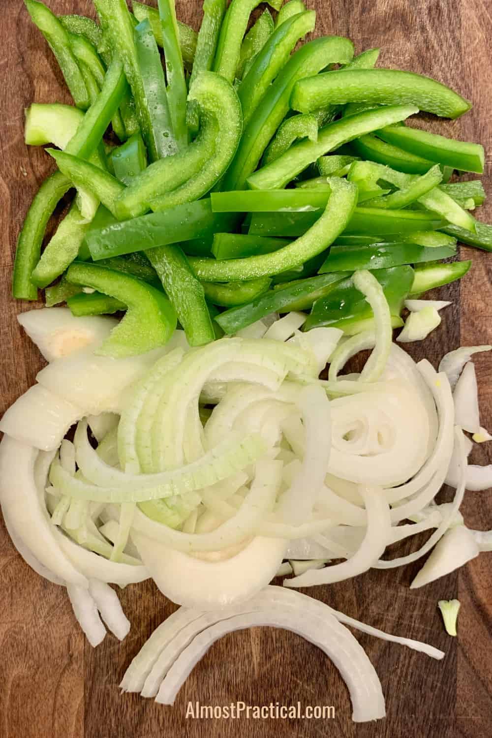 thin strips of sliced fresh onions and green peppers